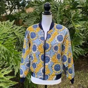 Vintage Notions medallion clock head bomber jacket. Versace vibes to the one.